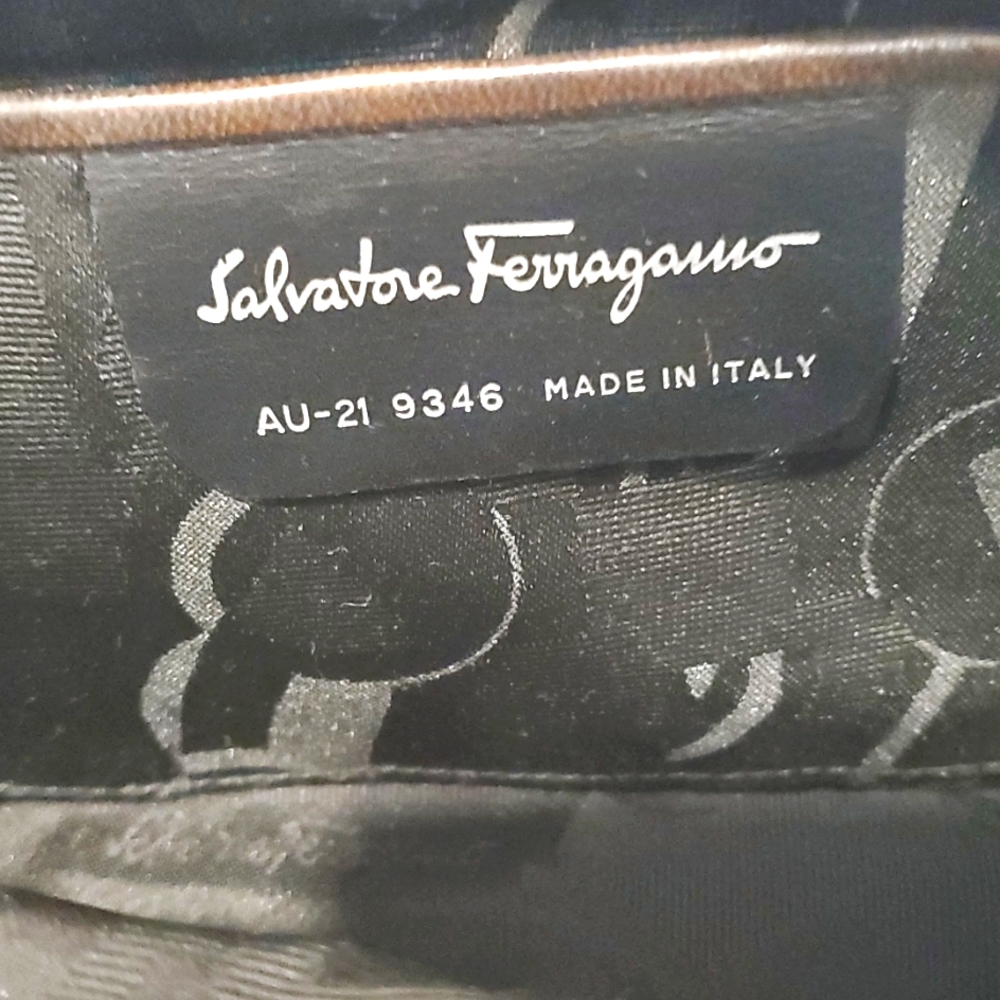 Salvatore Ferragamo canvas  brown small size purse.